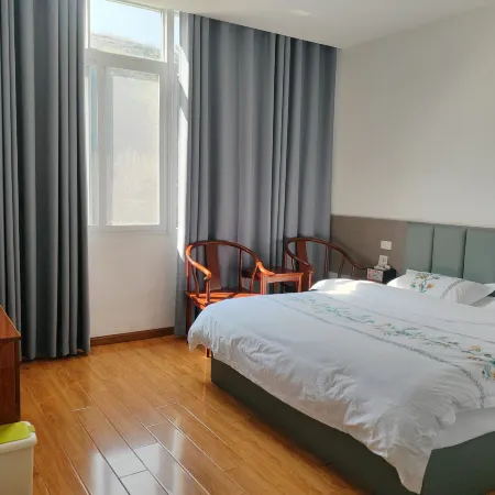 Yiliang Jiangquan Homestay Отели в г. Илян
