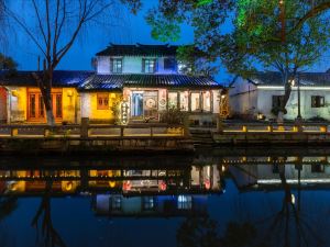 Zhouzhuang yunshenbuzhichu Hostel