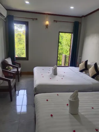 Vang Vieng Champa Hotel Отели рядом с достопримечательностью «Tham Jang»