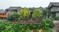 Longfengshan Ancient Town Zixiangyuan Homestay Отели рядом с достопримечательностью «Автобусная станция Ичуань»