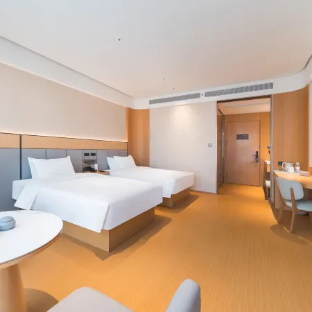 โรงแรม JI (ศูนย์กีฬามาตรฐานโอลิมปิกซูฮวา จิ้นเจียง เฉวียนโจว) โรงแรมในจิ้นเจียง