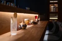 Qingdao Jinli Hotel - bar