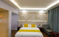 Xinping Sakura Holiday Hotel Отели рядом с достопримечательностью «Спортивный зал автономного округа Синьпин»