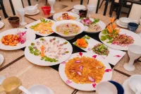 Dongfengyun Niuduoluo Music Castle Hotel - petit déjeuner