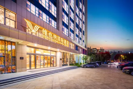 Vienna International Hotel (Dongying Wuyue Square Branch) Отели в г. Дуньин