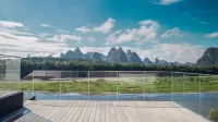 Yangshuo Percent Hotel  (West Street Li River) Hotels near Yangshuo Railway Station