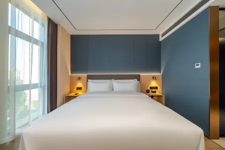 Elong Anyue Hotel (Shanghai Hangtou Pulehui Plaza Branch) Отели рядом с достопримечательностью «Shanghai University of Medicine & Health Sciences (Pudong Campus)»