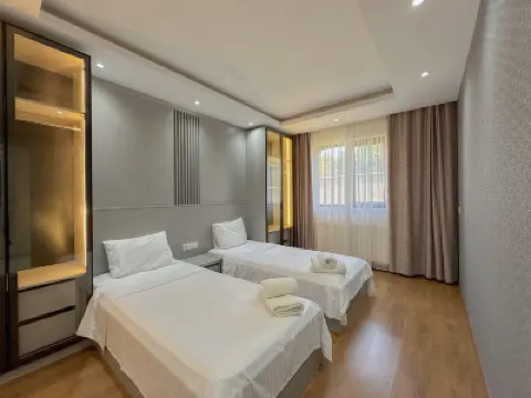 Flower City Suites Hotel di 