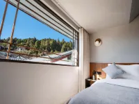Lijiang Sanli Tian Vacation Cottages 木府（ムフ）周辺のホテル