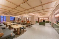 Orange Dandong Railway StationYalujiang Hotel - فطور