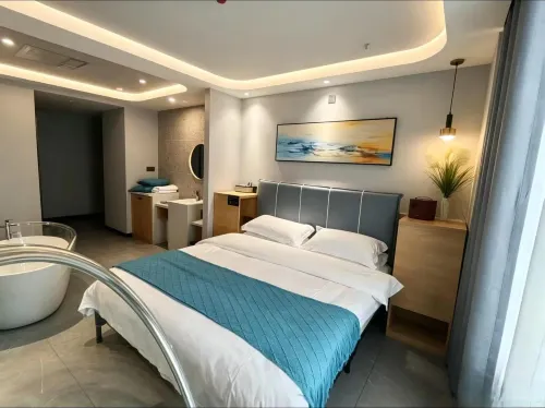 Yunduo Art Hotel (Urumqi High Speed Railway Station Baoneng City ) - جاكوزي