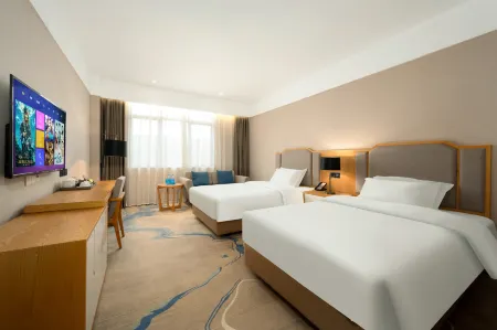 Qianmei International Hotel (GanZhou Xinfeng West High-speed Railway Station) Отели рядом с достопримечательностью «Chenyi Square»