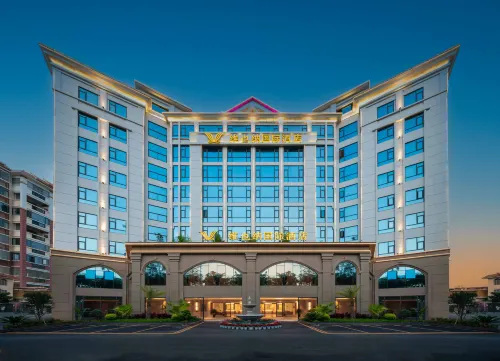Vienna International Hotel (Dehong Mangshi Airport) - Parkplatz