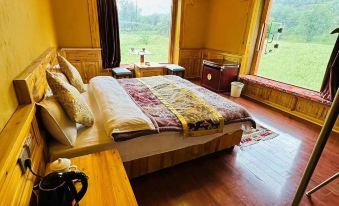 Kangding Huaxiang Siyizhijia Homestay