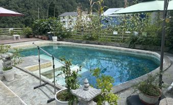 Yujian Yuanshan Villa Wild Garden Hot Springs Homestay (Hailuogou Glacier Forest Park)