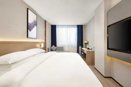 Boman Hotel (Baoding West Street Railway Station Store) Отели рядом с достопримечательностью «Baoding Zoo»