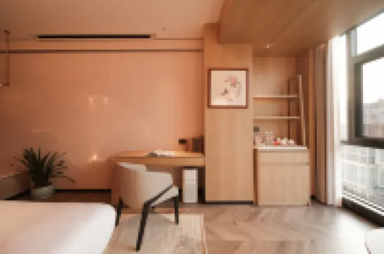 "푸얼 무윤 가든 호텔"