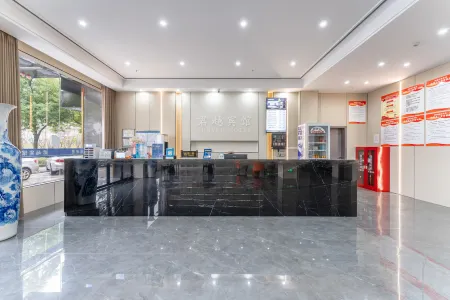 Junyue Hotel (Jinxian Railway Station Branch) Отели в г. Цзиньсянь