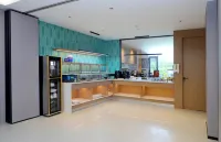 โรงแรมอินน์เดลิคาซี่ แอนด์ วอร์ม·การ์เดนเนีย บลอสซัม - พร้อมอาหารเช้า