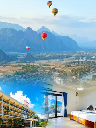 Lisha Riverside Hotel（The Grand Riverside Hotel） Отели рядом с достопримечательностью «Wat That»