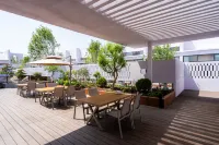 Purple House Koi Pond Courtyard Guesthouse - breakfast