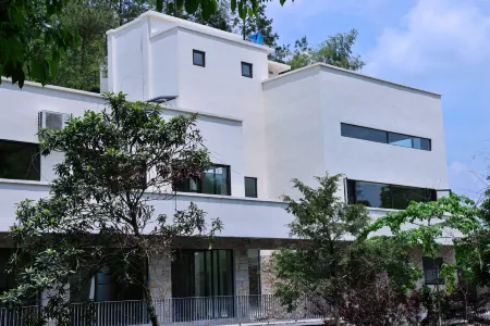 Floral Hotel · Wuyi Green Maple Valley Hotel Отели рядом с достопримечательностью «Huangjiali Ancient Trees»