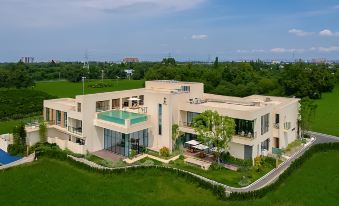 Xindu Xiangtou Qingan Daotian Hotel