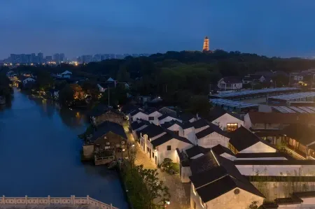 Wanda Yi, Suzhou Shantang Street Отели рядом с достопримечательностью «Suzhou University of Science and Technology (Jiangfeng Campus)»