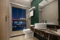 Manston Holiday Hotel (Wuhu Anhui Normal University Huajin Campus International Exhibition Center)