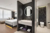 Yun Nan She Holiday Hotel (Qiqiqiao Shiqiao Market Branch, Jinzhou Railway Station)