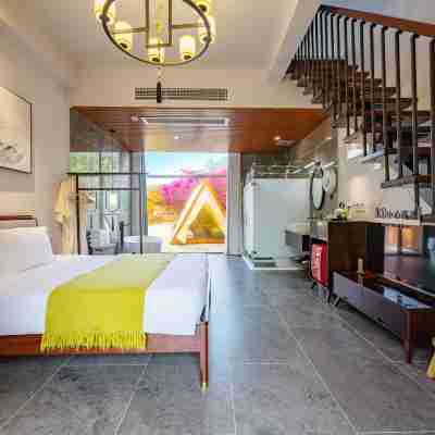 潿洲島芙羅拉私家花園度假民宿（貝殼沙灘店） Rooms