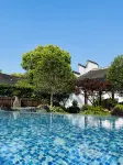Sansheli Garden Hostel Отели в г. Тунсян
