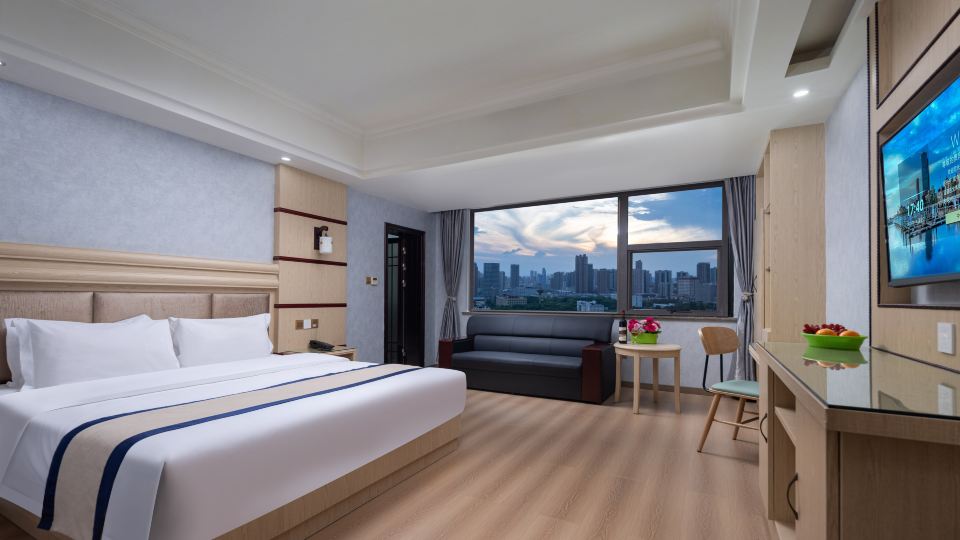 Yueyang Xinjia Business Hotel (Bazimen Yueyang East Railway Station)