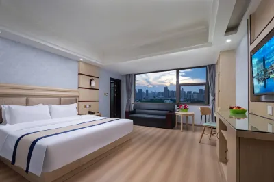 Yueyang Xinjia Business Hotel (Bazimen Yueyang East Railway Station)