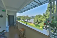 Leshan Futai Homestay (Zhanggong Bridge) - Romantische