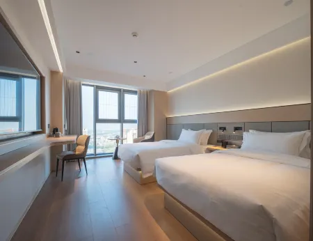 Jiang Su Hotel (Wenjiang Pearl River Square Guanghua Park Subway Station Branch) Отели рядом с достопримечательностью «Chengdu Normal University»