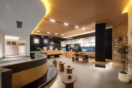 Xingwang Designer Hotel (Chongqing Yangjiaping Pedestrian Street Branch) Отели рядом с достопримечательностью «Chongqingligong University»