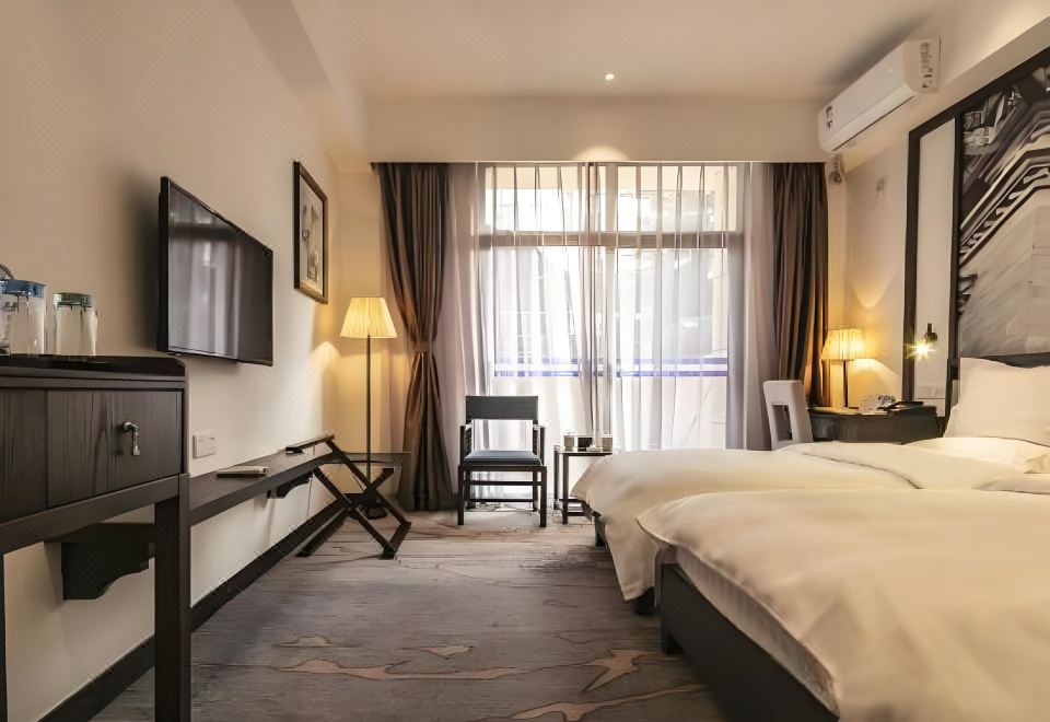 관두 호텔 쿤밍의 침대 사진