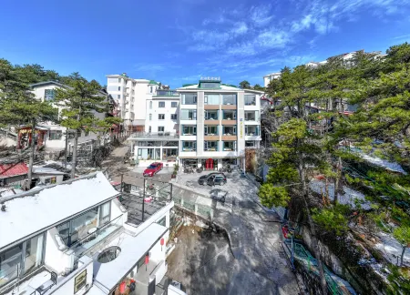 Lushan Gaoyi Hotel (Sudao Ruiqin Lake Side Store) Отели в г. Лу-Шан