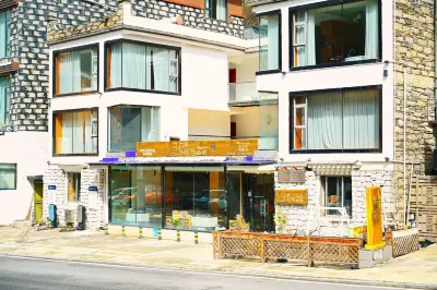 Huayu Nature Homestay (Siguniang Mountain Branch) Hotel di Xiaojin