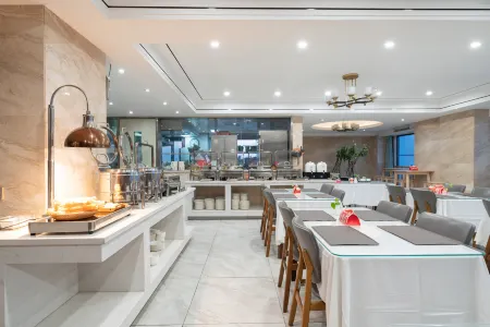 Elong R.YUN Hotel (Jinan Wanhong Plaza) Отели рядом с достопримечательностью «Hua Hill»