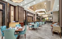 Pengfei Guobin Hotel - Desayuno