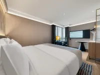 Yuyue Esports Hotel (Wuxi Meihua Li Wuyue Water Street Branch) Wuxi otelleri