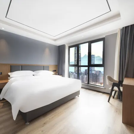 Yixi Hotel (Leshan High Speed Railway Station Shihao Plaza)
