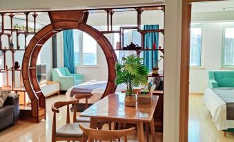 Qingdao Shangpin Liwan Apartment (Wuyue Plaza Surging Island Store)