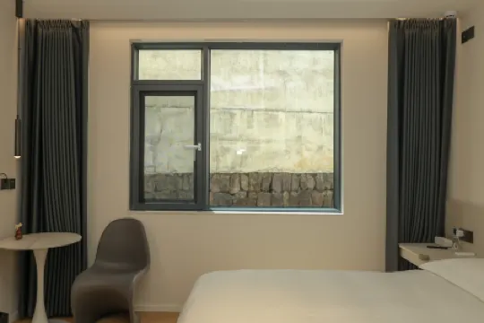 liu shu Отели рядом с достопримечательностью «Shishe Village»