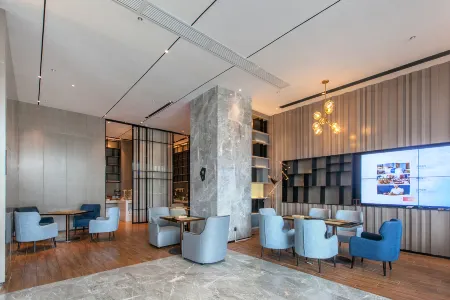 MAGIM|Urban Aerial Night ·View Design Sense Enjoy Cinema Hotel Отели рядом с достопримечательностью «Jinyin Lake Wetland Park»