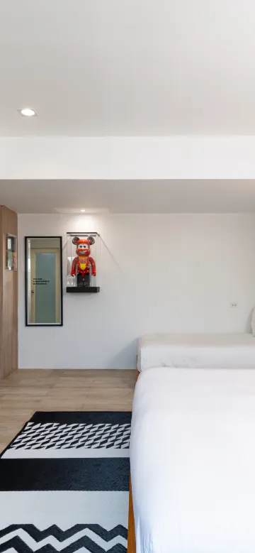 ห้องพักสำหรับสามคนพร้อมเตียงโซฟา