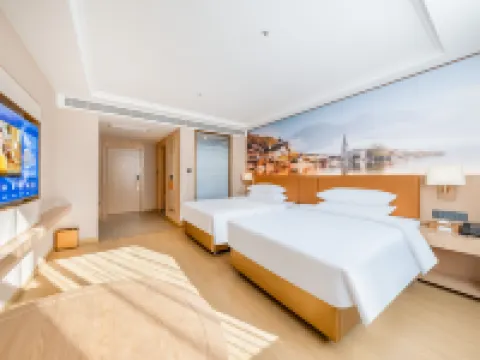 Vienna Hotel (Yuxi Xinping Gasa Flower Street) Hotel a Xinping