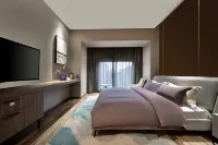 Taizhou Meizhu Hotel (Jiaojiang City Government Avenue Baolongcheng Store)